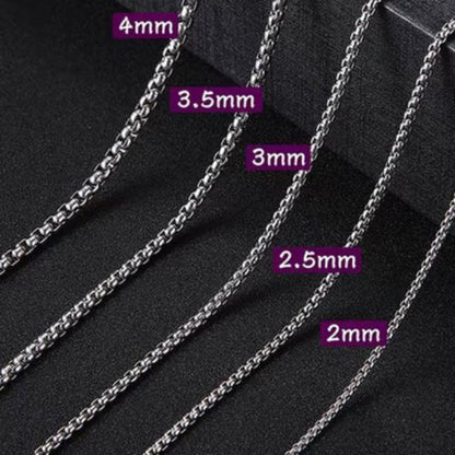 Aramat Jewels silver-colored stainless steel jasseron chains in various widths from 2mm to 4mm on a dark background.