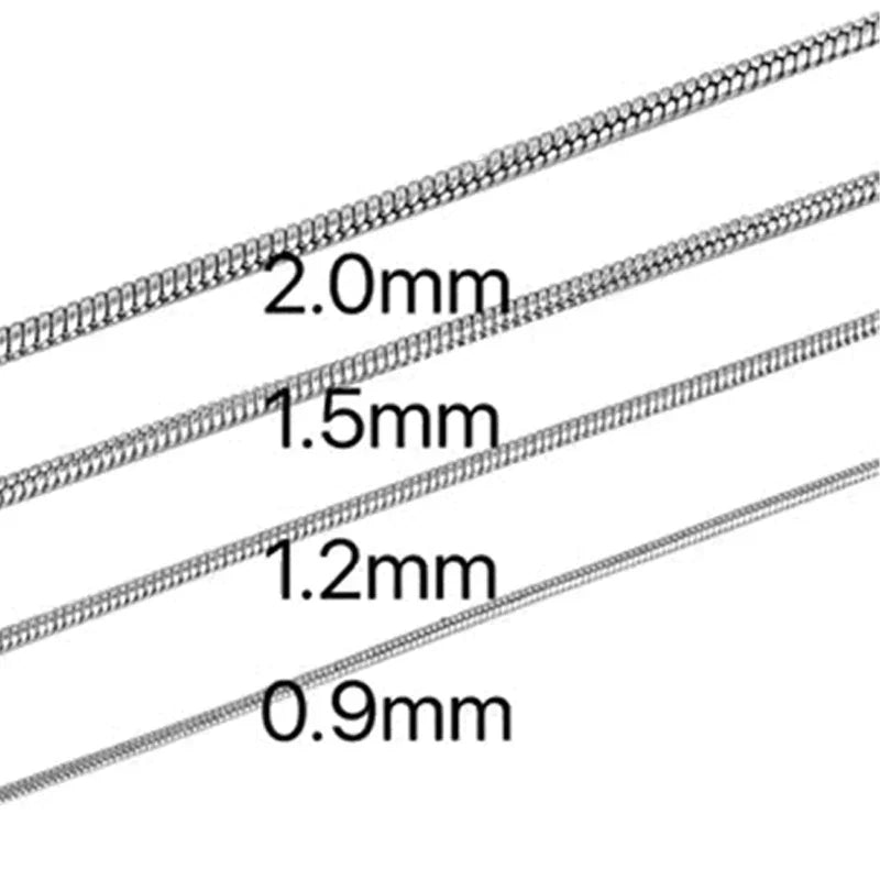 Aramat Jewels silver-colored stainless steel round snake chains in various thicknesses from 0.9mm to 2.0mm.