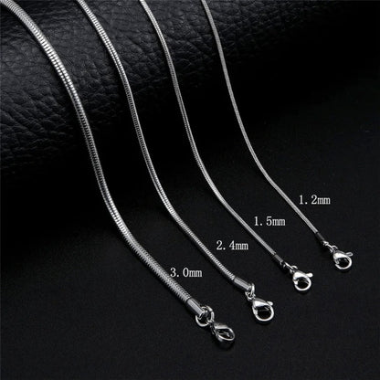 Aramat Jewels silver-colored stainless steel round snake chains in four different thicknesses with lobster clasps.
