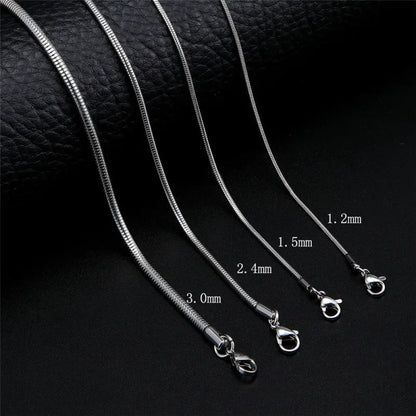 Aramat Jewels silver-colored stainless steel round snake chains in four different thicknesses with lobster clasps.