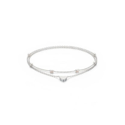 Aramat Jewels silver-toned steel anklet set featuring a delicate heart charm and small beads on a fine chain.