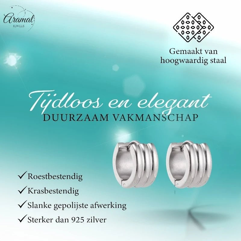 Aramat Jewels wide silver-colored steel hoop earrings with ribbed detail, 13x7mm, timeless and elegant design.