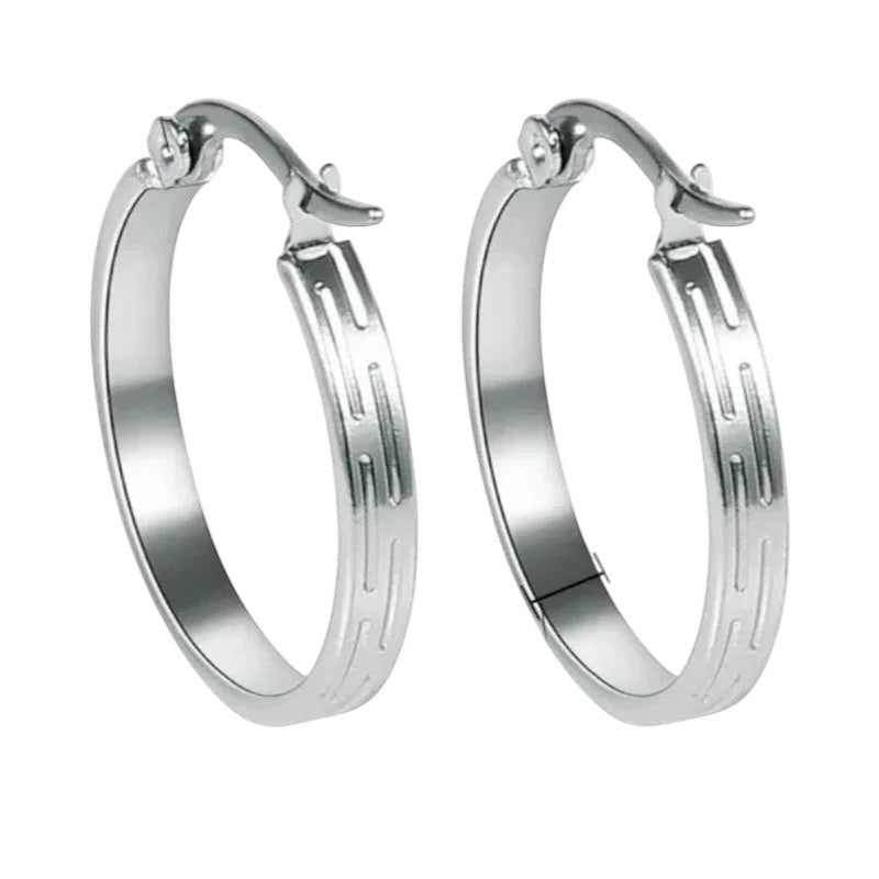 Aramat Jewels silver-tone stainless steel hoop earrings with a subtle striped pattern, 20mm diameter.
