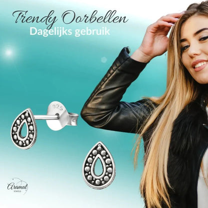 Aramat Jewels 925 sterling silver teardrop stud earrings with oxidized Bali-style bead pattern for daily wear.