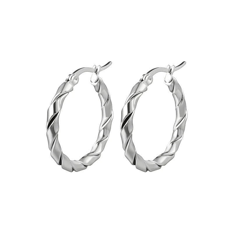 Aramat Jewels silver-tone stainless steel twisted hoop earrings, 45mm. Modern, trendy design for women.
