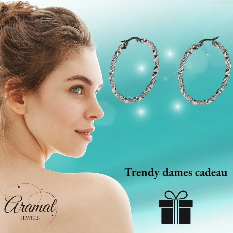 Aramat Jewels silver stainless steel twisted hoop earrings, 30mm or 40mm diameter, shiny finish.