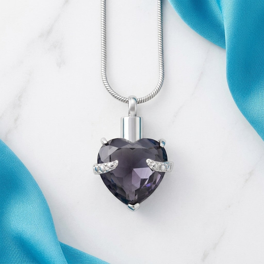 Aramat Jewels® stalen ashanger in hartvorm met grote paarse steen en zirkonia accenten, waterbestendig.