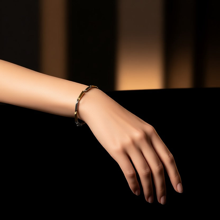 Aramat Jewels bicolor stalen bamboo schakel armband van 3mm breed en 22cm lang met karabijnsluiting.