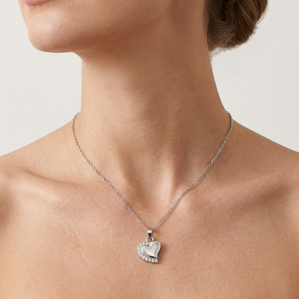 Aramat Jewels zilverkleurige stalen hart ashanger met transparante zirkonia's