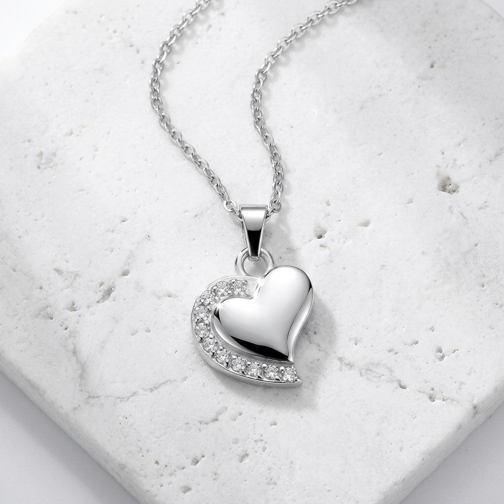 Aramat Jewels zilverkleurige stalen hart ashanger met transparante zirkonia's