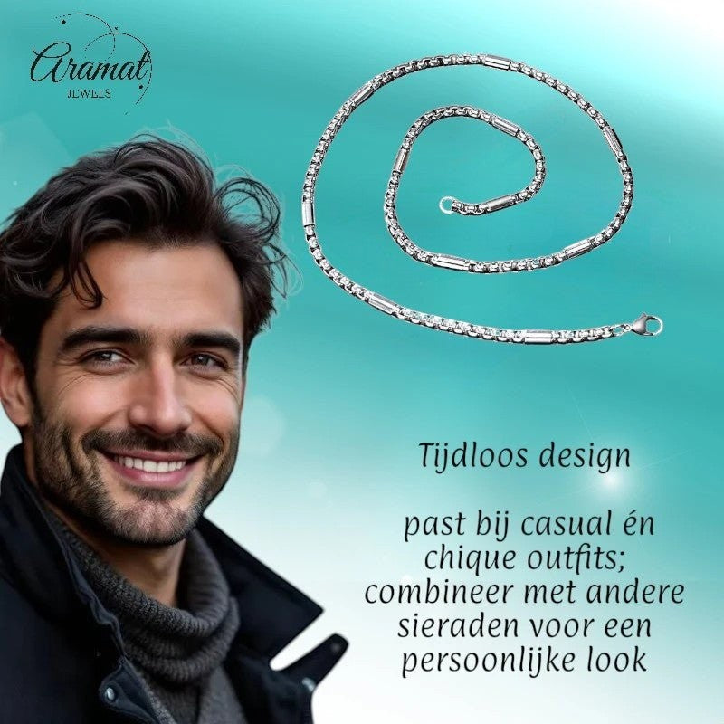 Aramat Jewels stalen jasseron ketting met staafjes, 60cm lang en 3mm breed, gedragen door een glimlachende man.