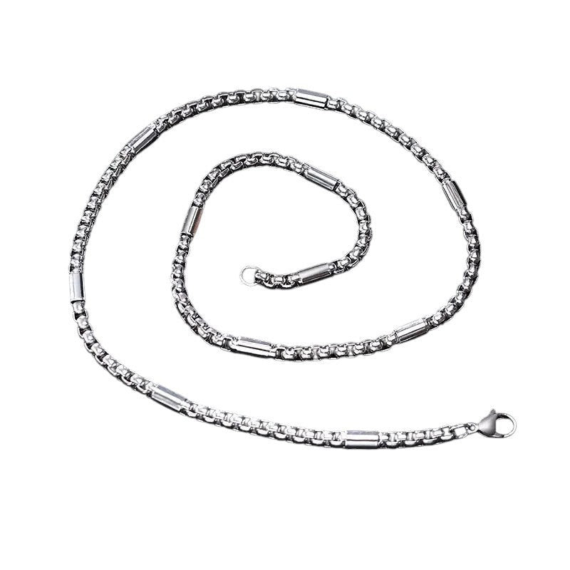 Aramat Jewels zilverkleurige RVS jasseron ketting van 60cm met ingelegde staafjes voor een robuuste uitstraling.