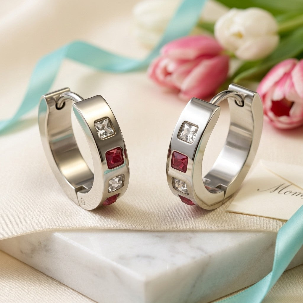 Aramat Jewels stainless steel hoop earrings with pink and clear cubic zirconia stones, 17mm diameter, hinged closure.