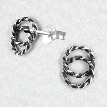 Aramat Jewels 925 sterling silver stud earrings featuring two overlapping circles with a twisted rope texture.