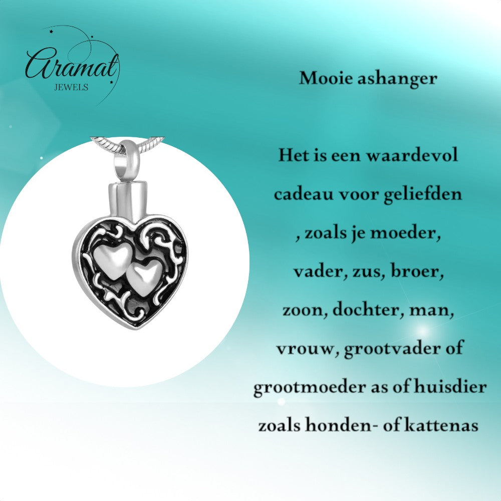 Aramat Jewels silver and black stainless steel cremation pendant with two hearts, 30x18mm.