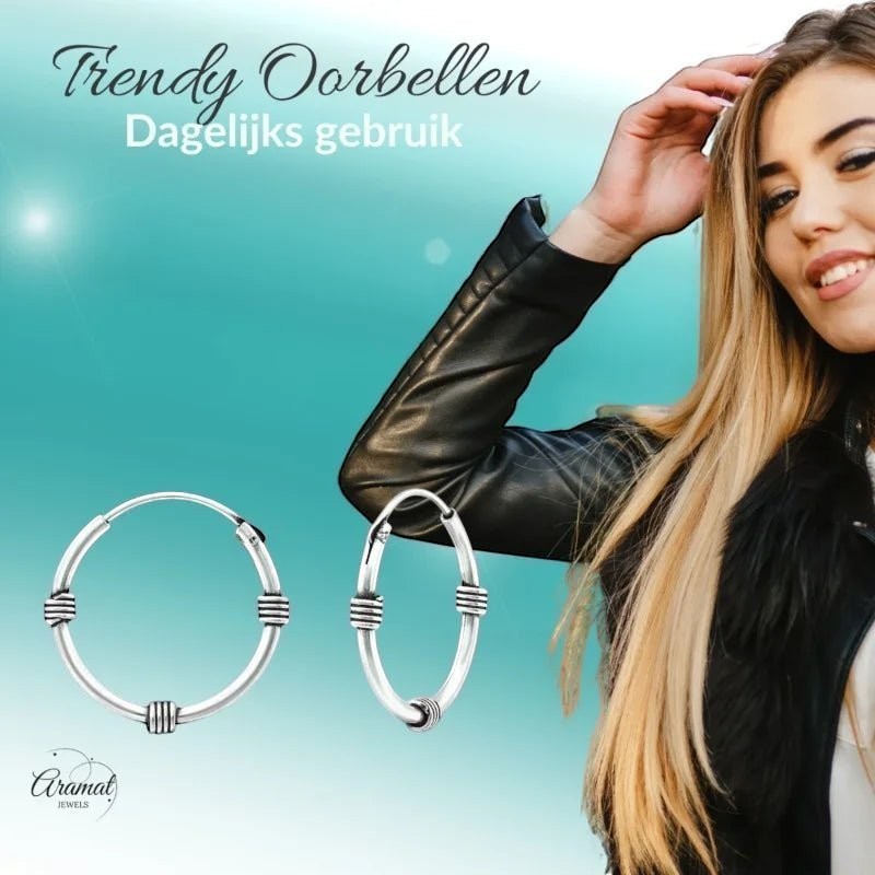 Aramat Jewels unisex silver Bali hoop earrings, 16mm diameter, with a textured band detail. Everyday wear.