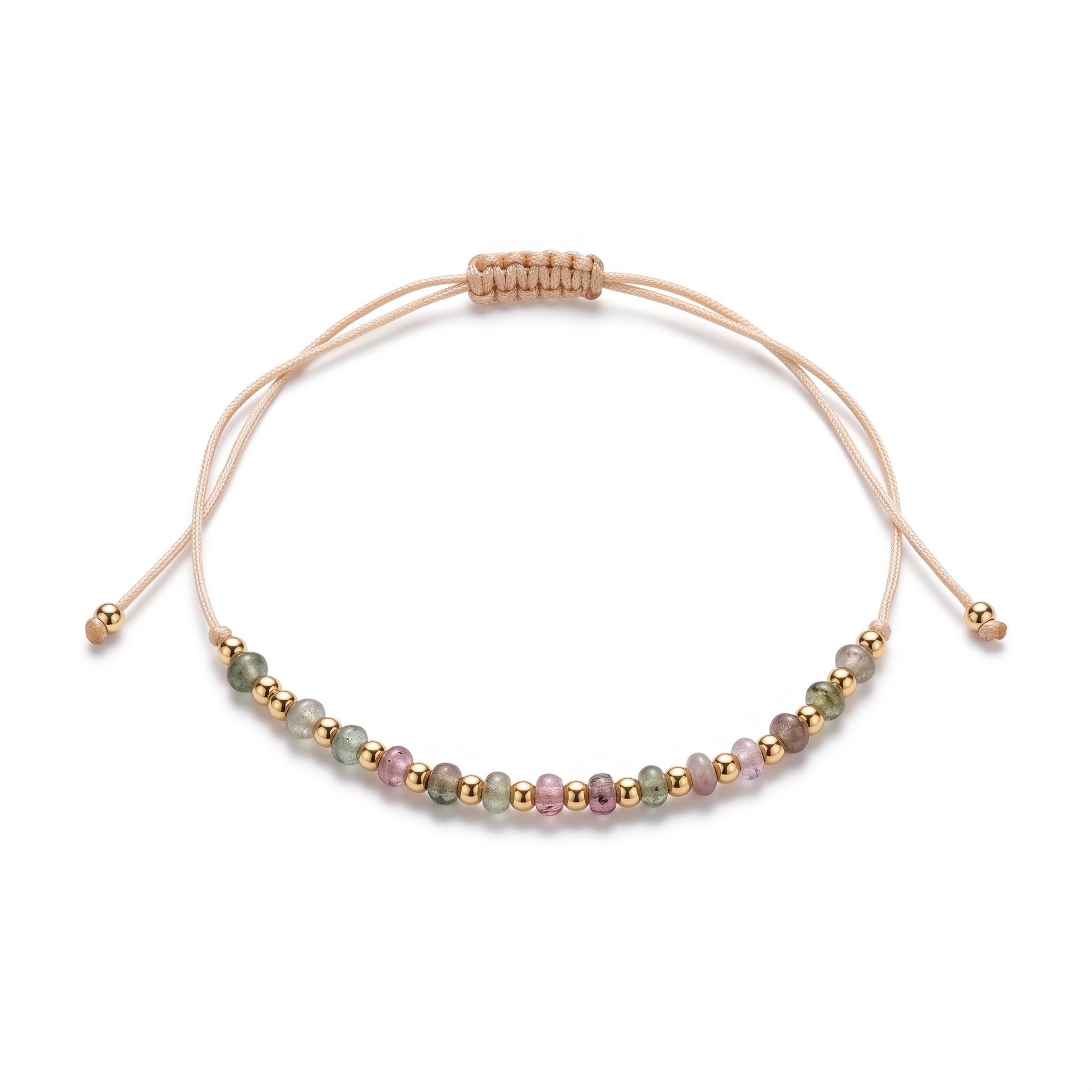 Aramat Jewels verstelbaar enkelbandje met kleurrijke cats eye kralen en goudkleurige accenten op beige touw.