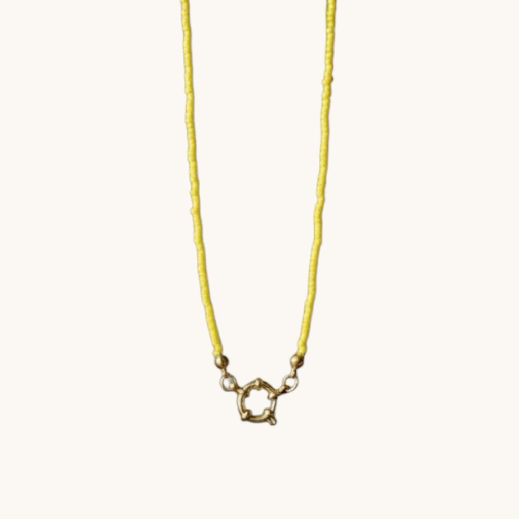 Aramat Jewels yellow beaded necklace with gold clasp, handmade from Rocailles beads and stainless steel.