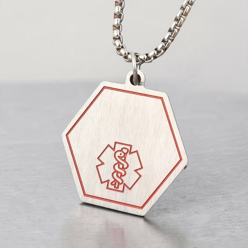 Aramat Jewels zeshoekige medische hanger van roestvrij staal met rode Staf van Aesculapius en bijpassende ketting