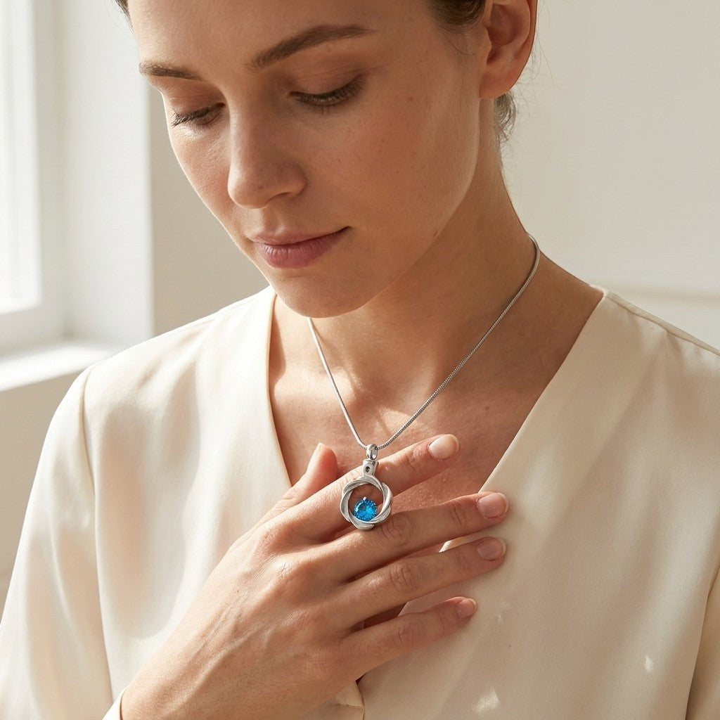 Aramat Jewels zirkonia stalen ashanger in zilverkleur met blauwe steen, zonder ketting.