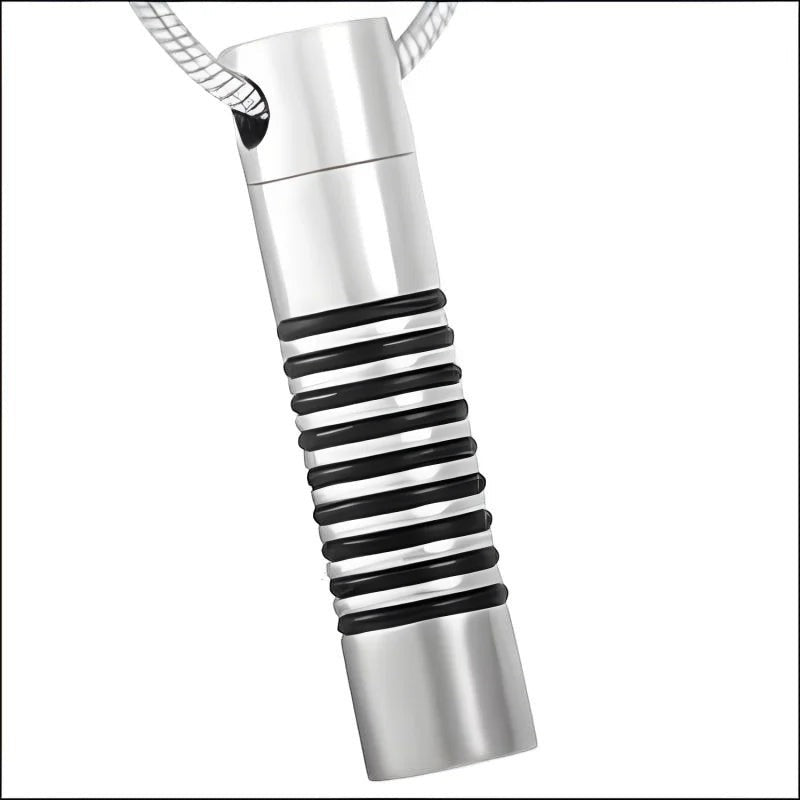 Aramat Jewels zilverkleurige stalen buis ashanger voor mannen met zwarte ringen. Discreet rouwsieraad.
