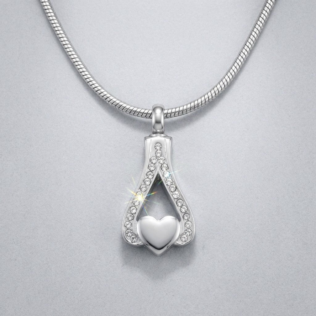 Aramat Jewels zilverkleurige ashanger in hartvorm met zirkonia steentjes, 316L edelstaal