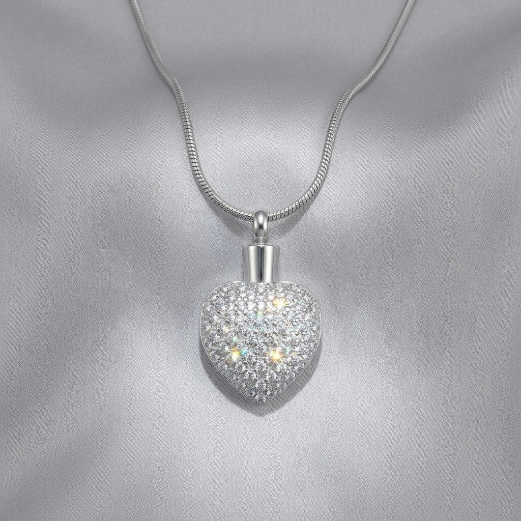 Aramat Jewels zilverkleurige stalen hart ashanger met zirkonia steentjes, waterbestendig en geschikt voor dagelijks gebruik.