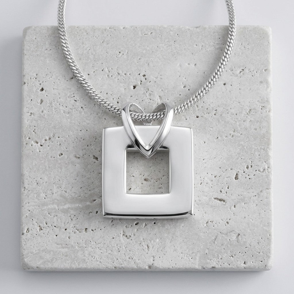 Aramat Jewels zilverkleurige stalen ashanger in open vierkant design, 25x20 mm. Een minimalistisch herinneringssieraad.