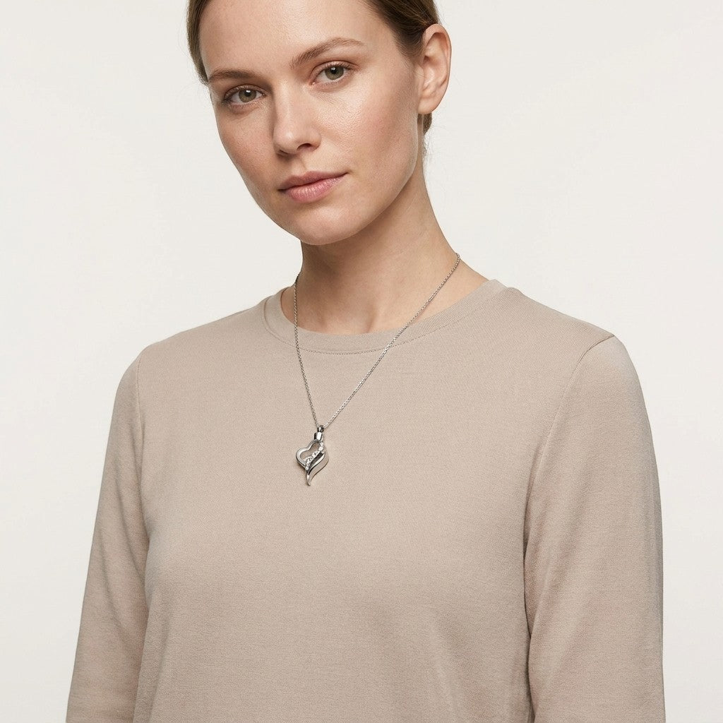 Aramat Jewels® zilverkleurige stalen ashanger met zirkonia, hartvormig, waterbestendig