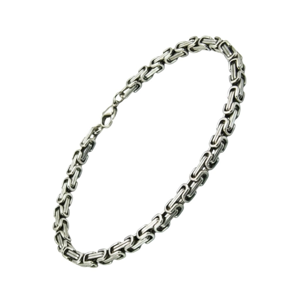 Zilverkleurige Aramat Jewels koningsschakel armband van 5mm breed RVS met een plat design.