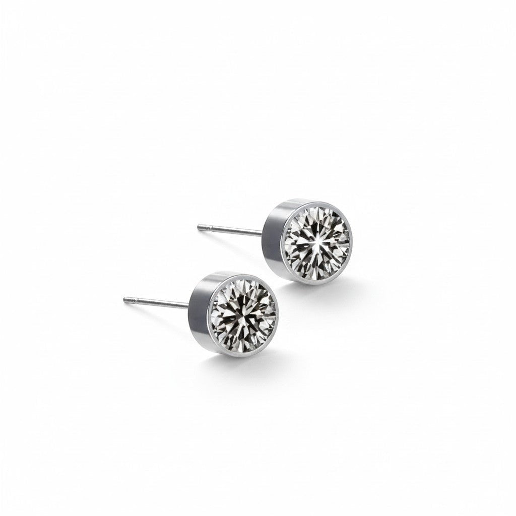 Aramat Jewels zilverkleurige oorstekers met grijs kristal (6mm), gemaakt van roestvrij staal.