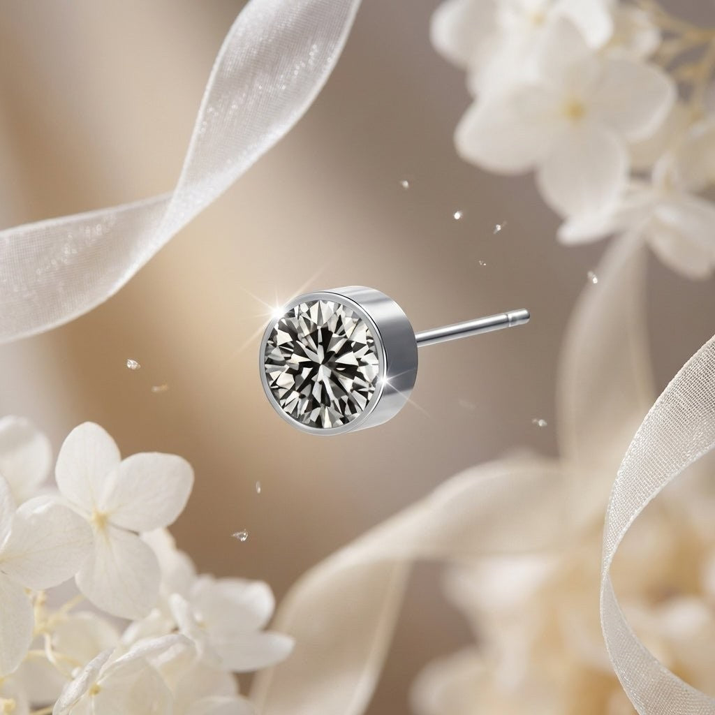 Aramat Jewels zilverkleurige oorstekers met grijs kristal van 6mm, gemaakt van roestvrij staal.