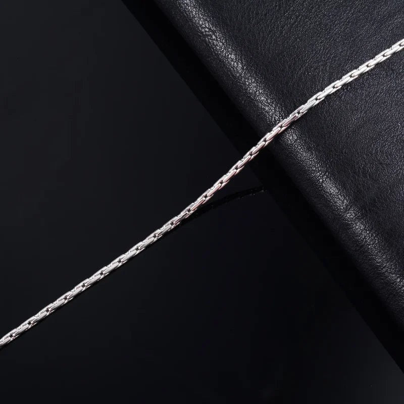 Aramat Jewels zilverkleurige slangenketting van roestvrij staal met een verfijnde en vloeiende schakelstructuur