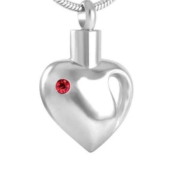 Aramat Jewels zilverkleurige stalen ashanger in hartvorm met rode zirkonia