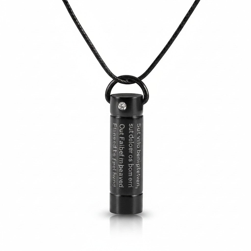 Aramat Jewels zwarte buisvormige crematiehanger van roestvrij staal met gebedstekst, 3x0,9cm.