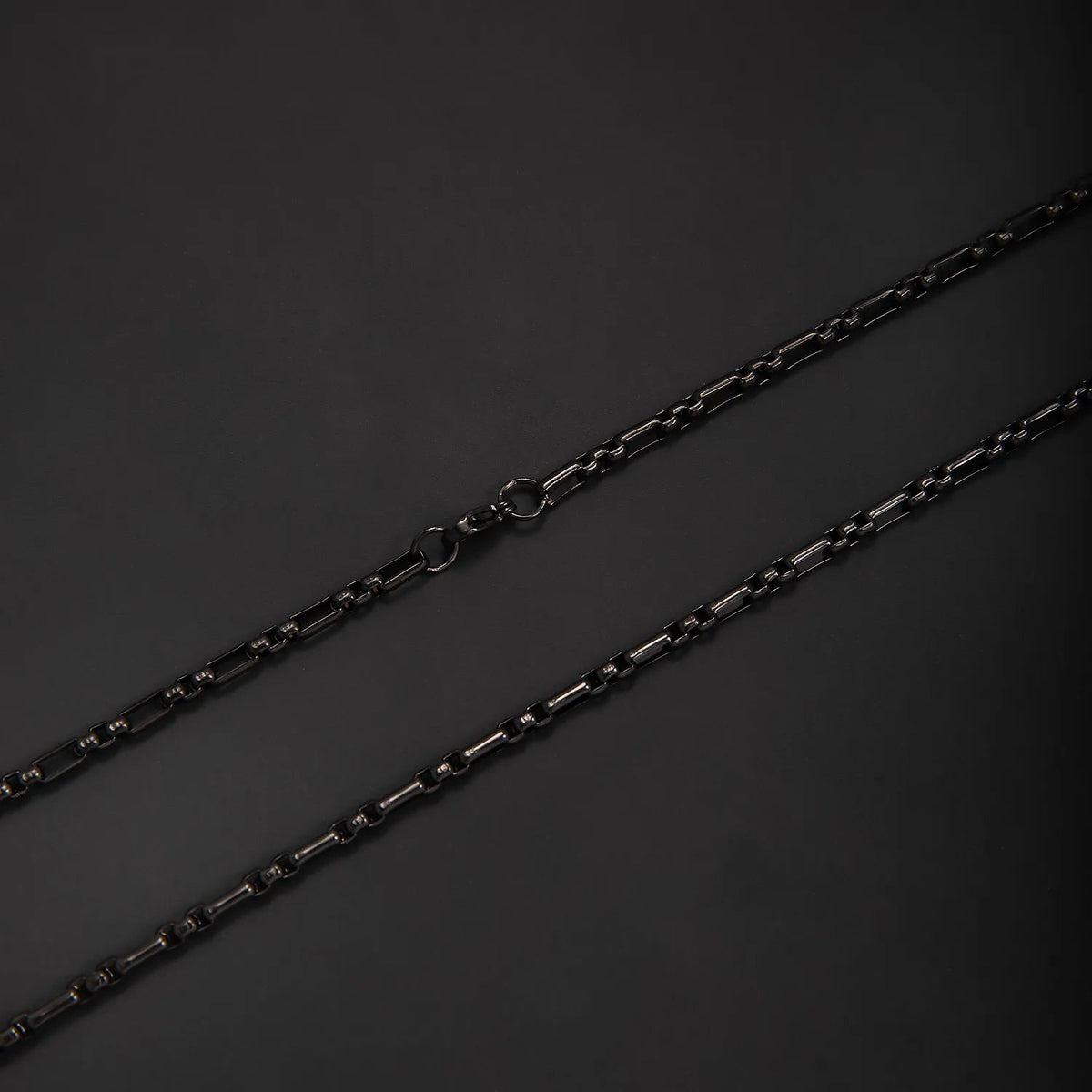 Aramat Jewels zwarte fantasie jasseron ketting van roestvrij staal met afwisselende rechthoekige en ronde schakels