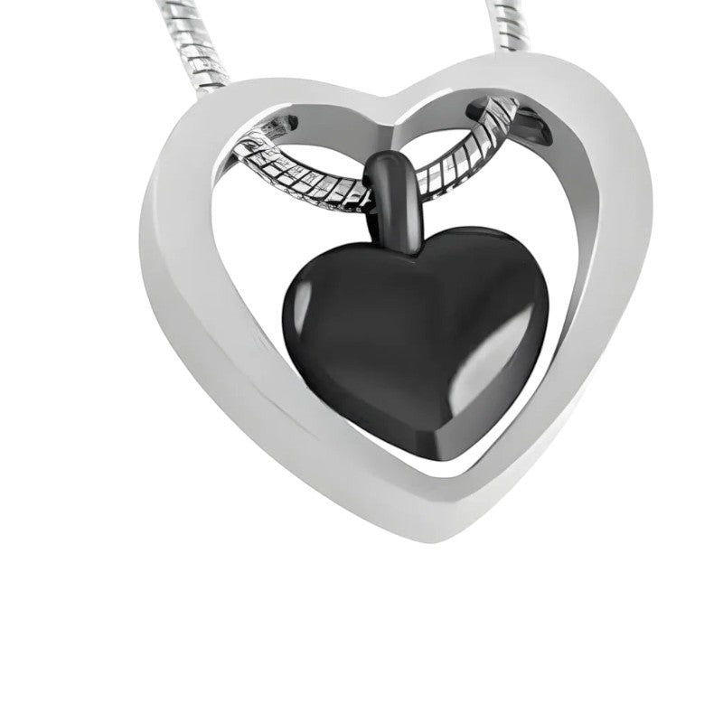 Aramat Jewels® zwarte stalen crematiehanger in hartvorm met een open hart frame. Roestvrij staal.