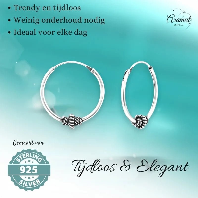 Aramat Jewels pair of 18mm sterling silver Bali hoop earrings with ethnic bead detail, timeless and elegant design.