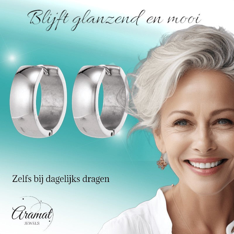 Aramat Jewels silver-coloured stainless steel hoop earrings, 13mm diameter, 7mm width, unisex design.
