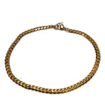 Een gouden schakelarmband met sluiting