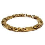 Een gouden armband met een schedel erop