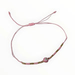 Roze Koord Armband Met Kraal En Roze Boze Oog Steen