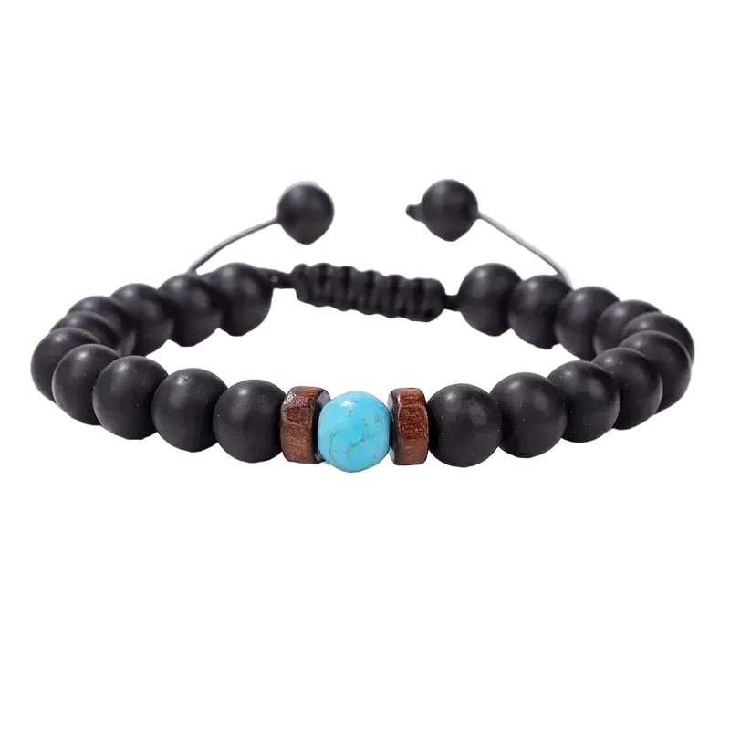 De zwarte lava armband met turquoise steen