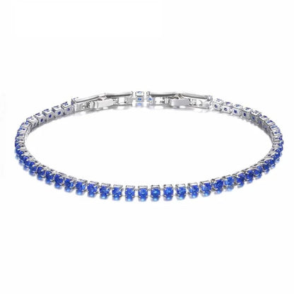 Zilveren Tennisarmband Met Blauwe Saffierstenen Van Aramat Jewels®.