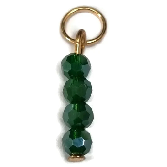 Sleutelhanger Met Groene Glazen Kralen En Gouden Ring In Product ’kralen Bedeltje Ab Pacific Blauw Met