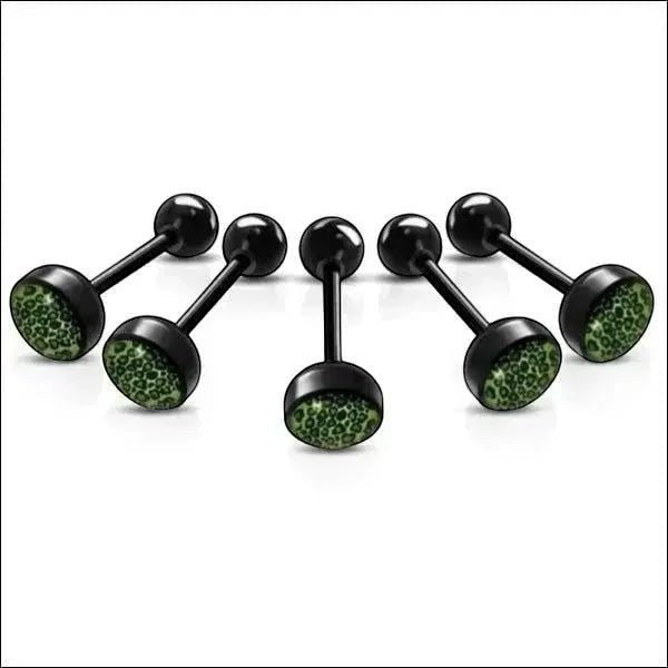 Een paar zwarte en groene glitterpiercings