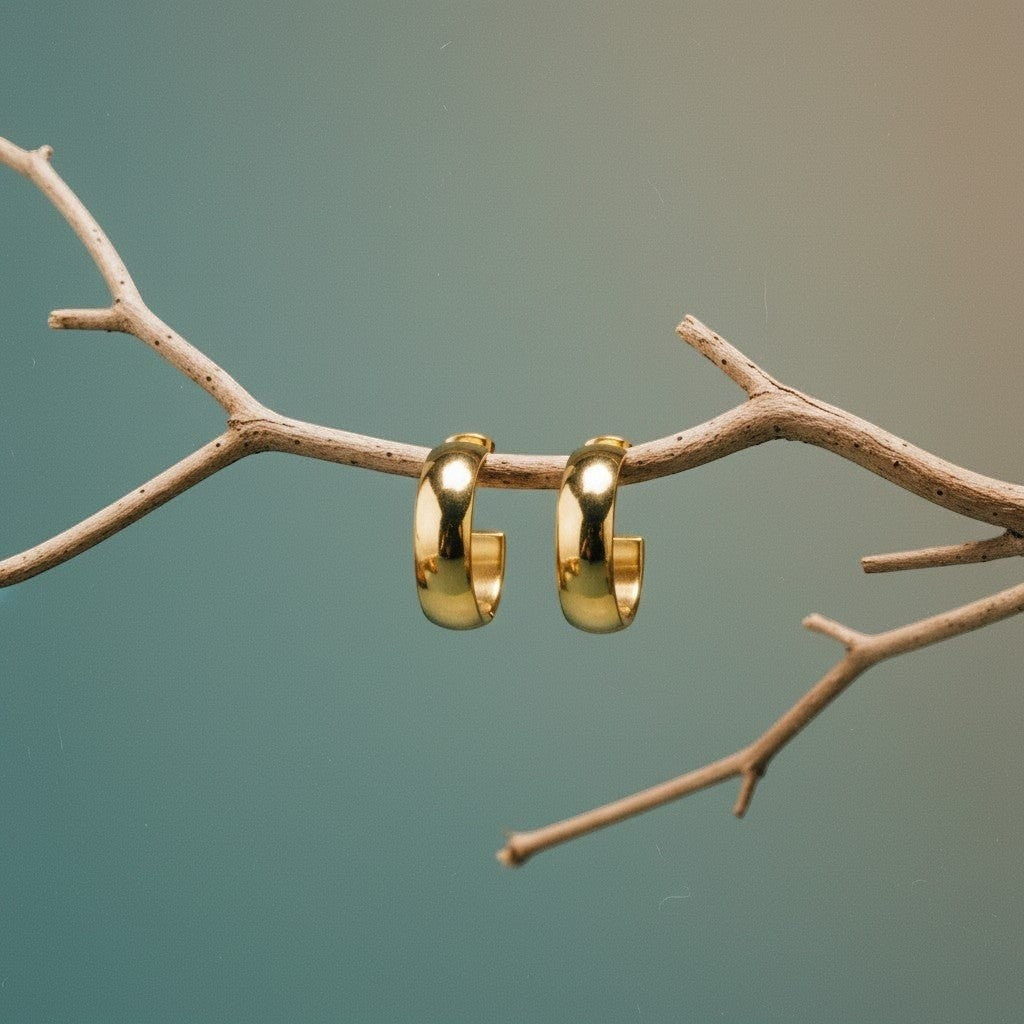 Brede RVS Oorringen Glad Glanzend Goudkleur 22mm - Aramat Jewels - Oorringen - cadeautip