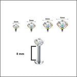 Een set van vier chirurgische piercings van verschillende grootte met een diamant