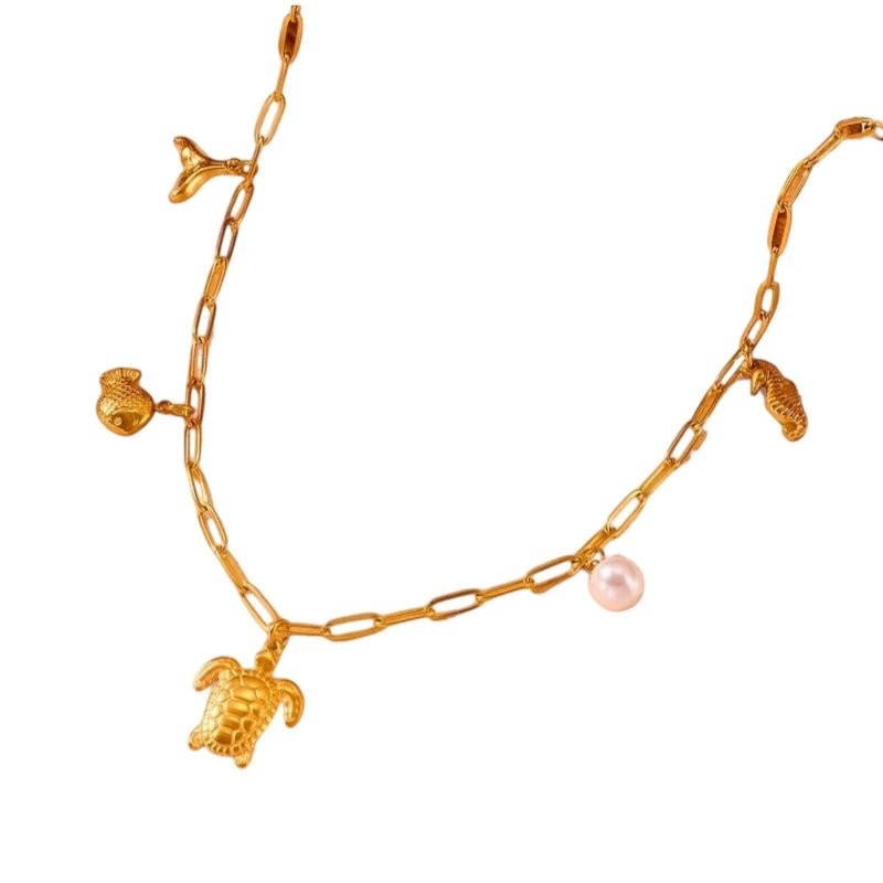 Goudkleurige damesketting met parel & zee - bedels – 45 cm - ket1174 - 511141 - Halskettingen kopen# - 45cm - alles - Bedelketting