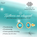 Gouden en turquoise oorbellen.